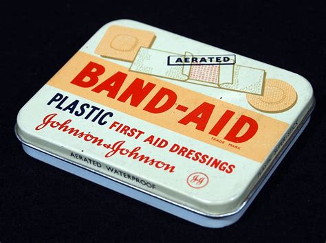 when did band-aid stop using the metal box|old band aid tins.